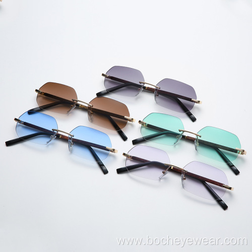 New European and American fashion frameless polygon Sunglasses Women's gradually changing color Sunglasses trend wood grain leg